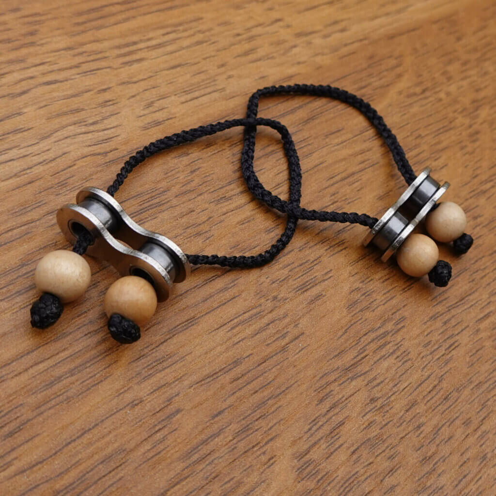Casse-tête en maillons de chaîne de vélo upcyclés