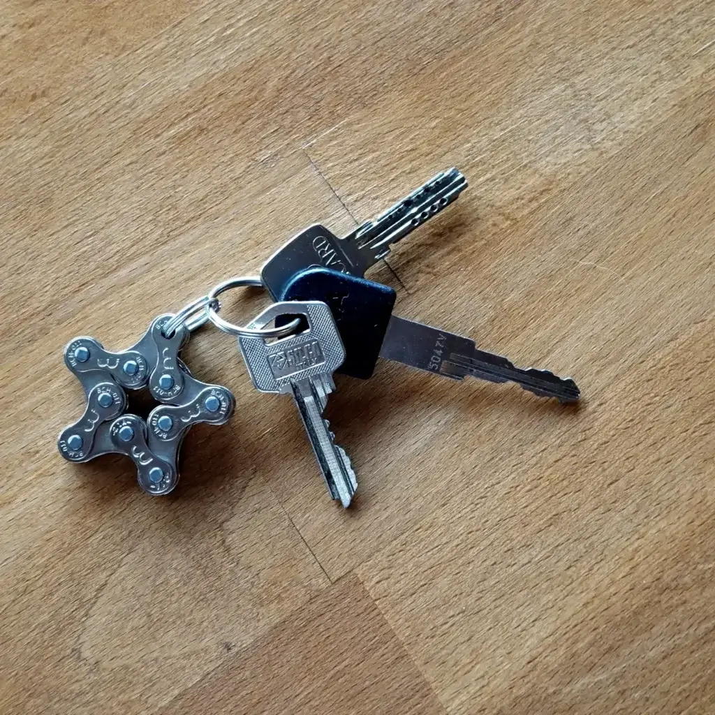 Porte-clés en forme d'étoile en chaîne de vélo upcyclée