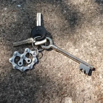Porte-clés bretzel en chaîne de vélo upcyclée