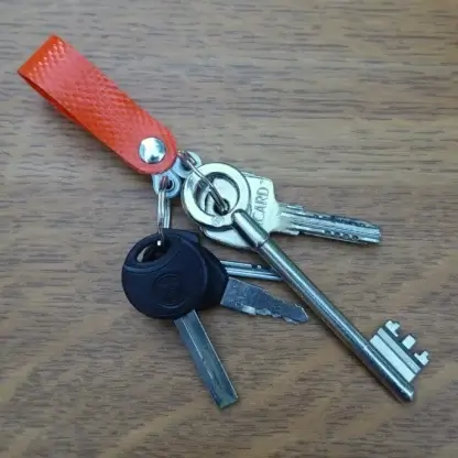 Porte-clés séparateur de trousseaux en tuyau de lance à incendie upcyclé