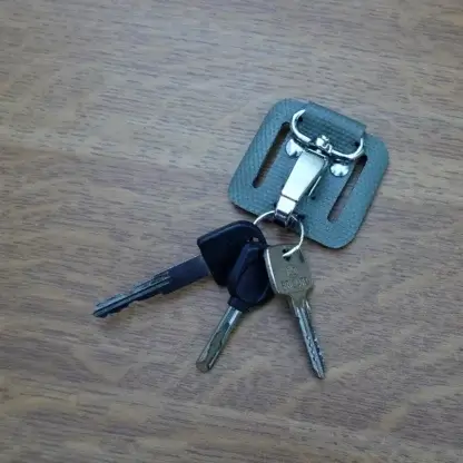 Porte-clés passant de ceinture en tuyau de lance à incendie upcyclé