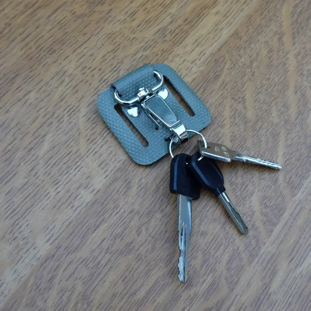 Porte-clés passant de ceinture en tuyau de lance à incendie upcyclé